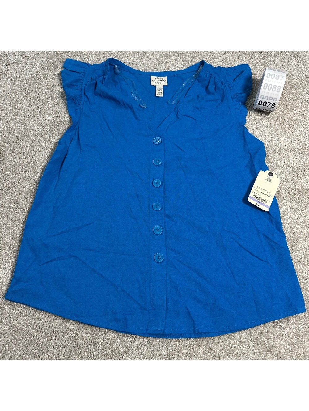 Blue button-front flutter sleeve blouse